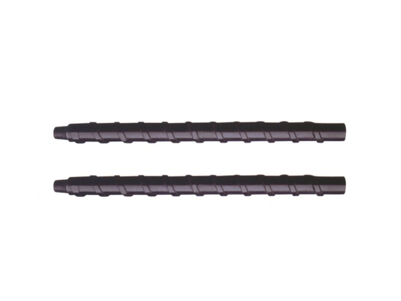 Ribbed drill pipes for underground mining machines